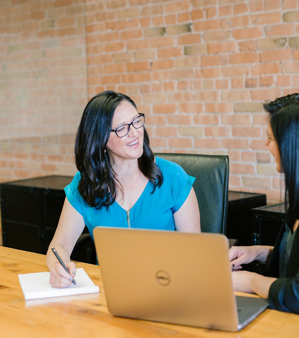 Coach reviewing work with a client